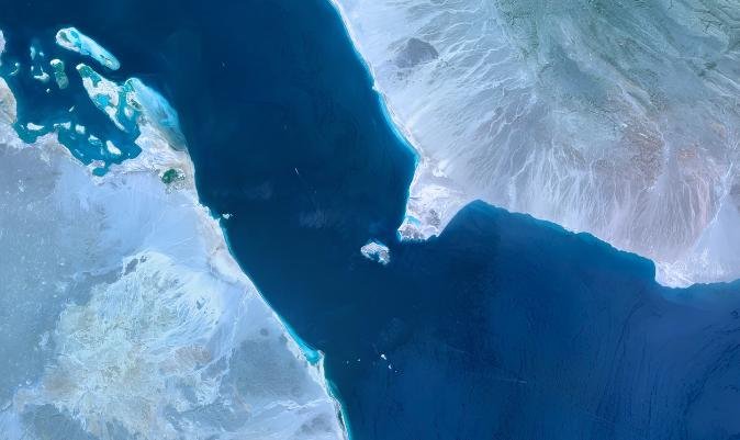 Aerial view of the Bab el-Mandeb Strait showcasing the narrow waterway between the Arabian Peninsula and the Horn of Africa.