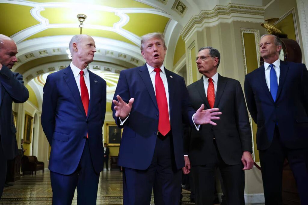 President Donald Trump (center) speaks to the media as he departs with (left to right) US Sen. Mike Lee (R-UT), US Sen. Rick Scott (R-FL), US Senate Majority Whip John Barrasso (R-WY), and US Sen. Majority Leader John Thune (R-SD) after meeting with Republican senators at the US Capitol on Wednesday in Washington, DC. Kevin Dietsch/Getty Images)